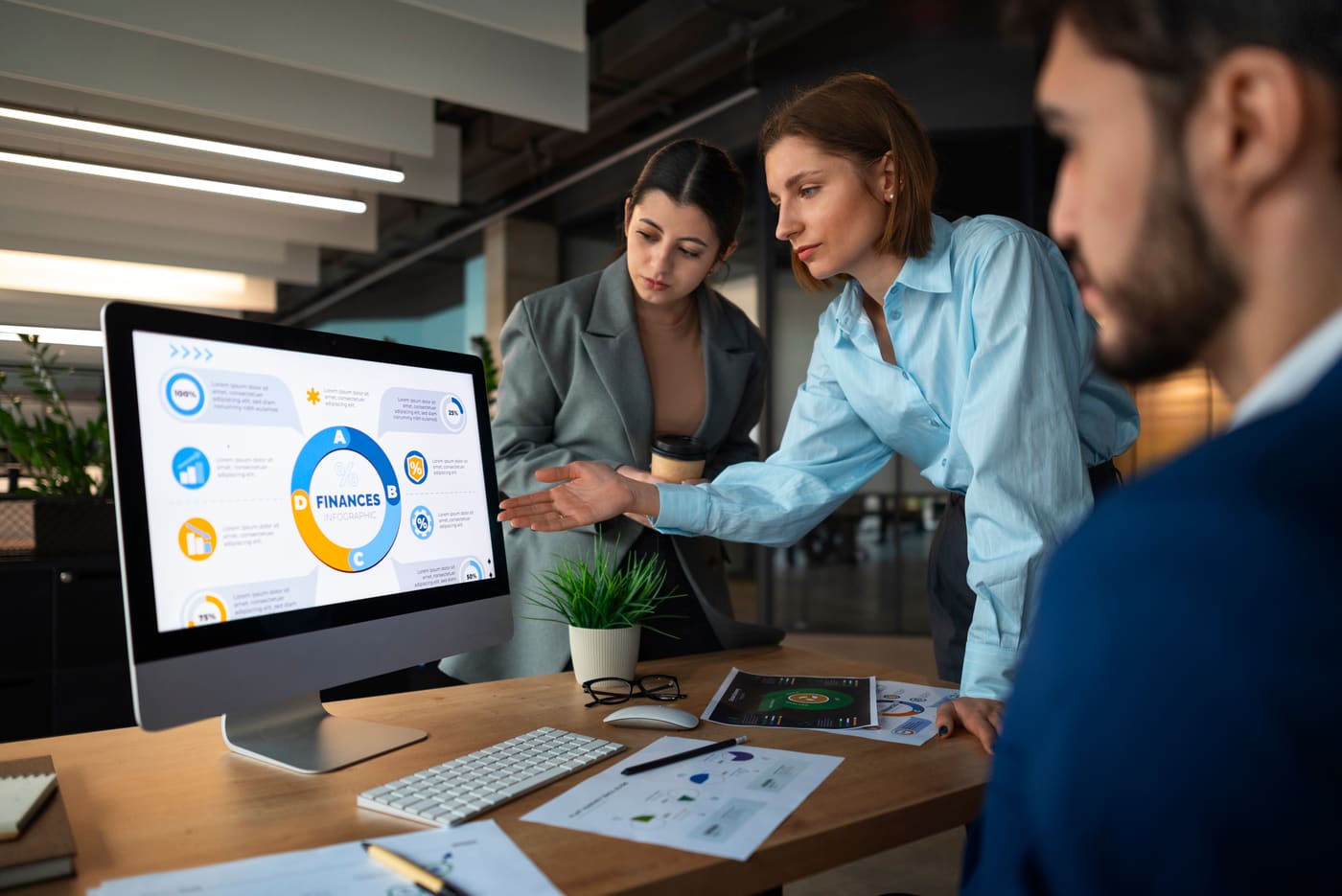 A team reviewing finance dashboards together